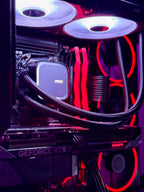Close-up of a computer motherboard with MSI graphics card and red LED lighting