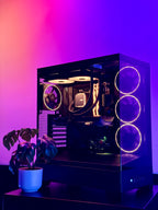 Glossy black computer case with RGB lighting on a purple gradient background