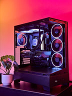 A futuristic black gaming pc with tasteful white RGB accents by Shook PC with a 9070 XT and 9800X3D gaming CPU