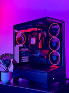 A futuristic black gaming pc with tasteful white RGB accents by Shook PC with a 9070 XT and 9800X3D gaming CPU