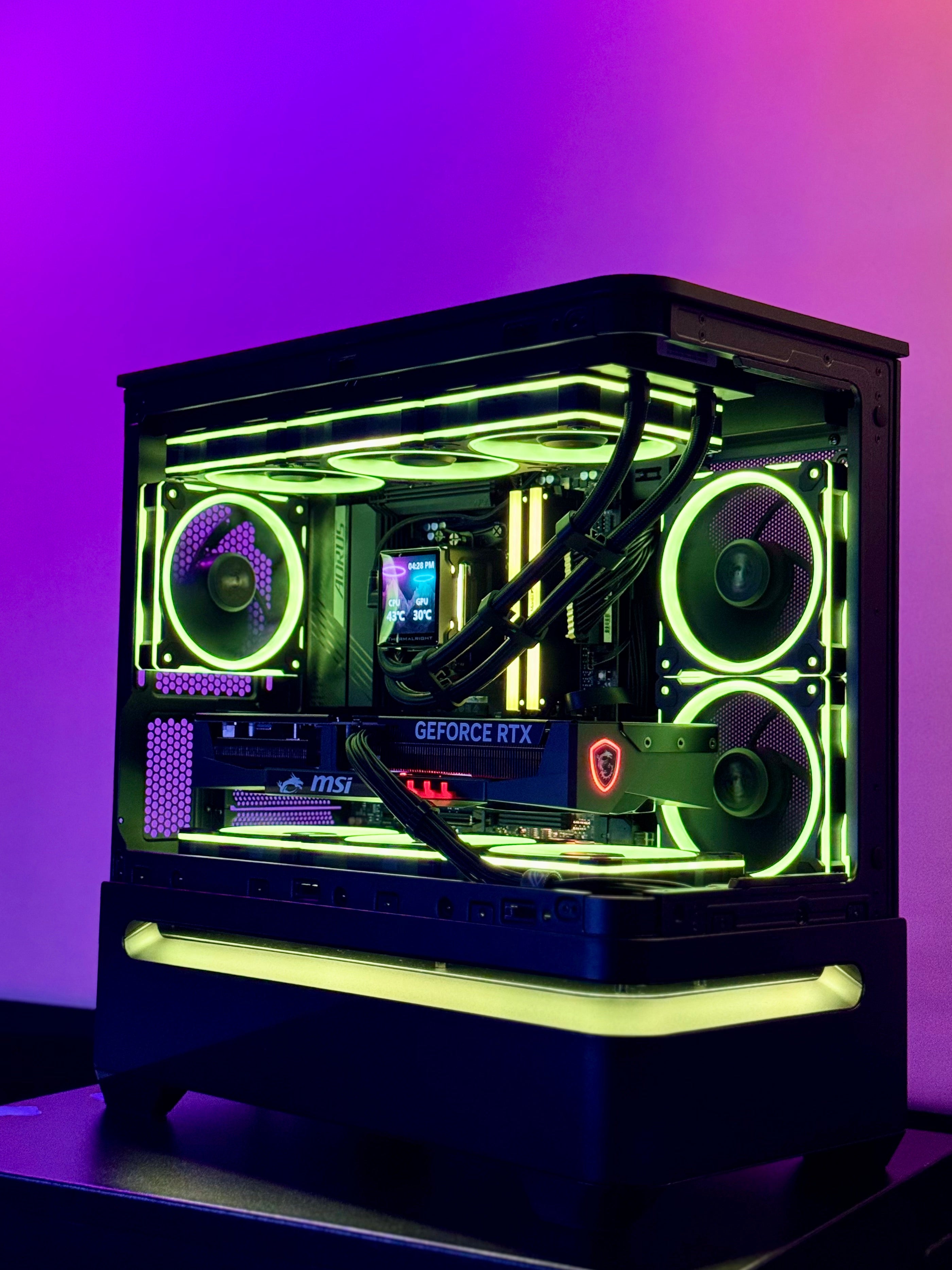 High-end gaming PC called Let's Ride by Shook PC featuring a 5070 Ti and 9850X3D in the ASUS AP202 mATX Desktop Case.