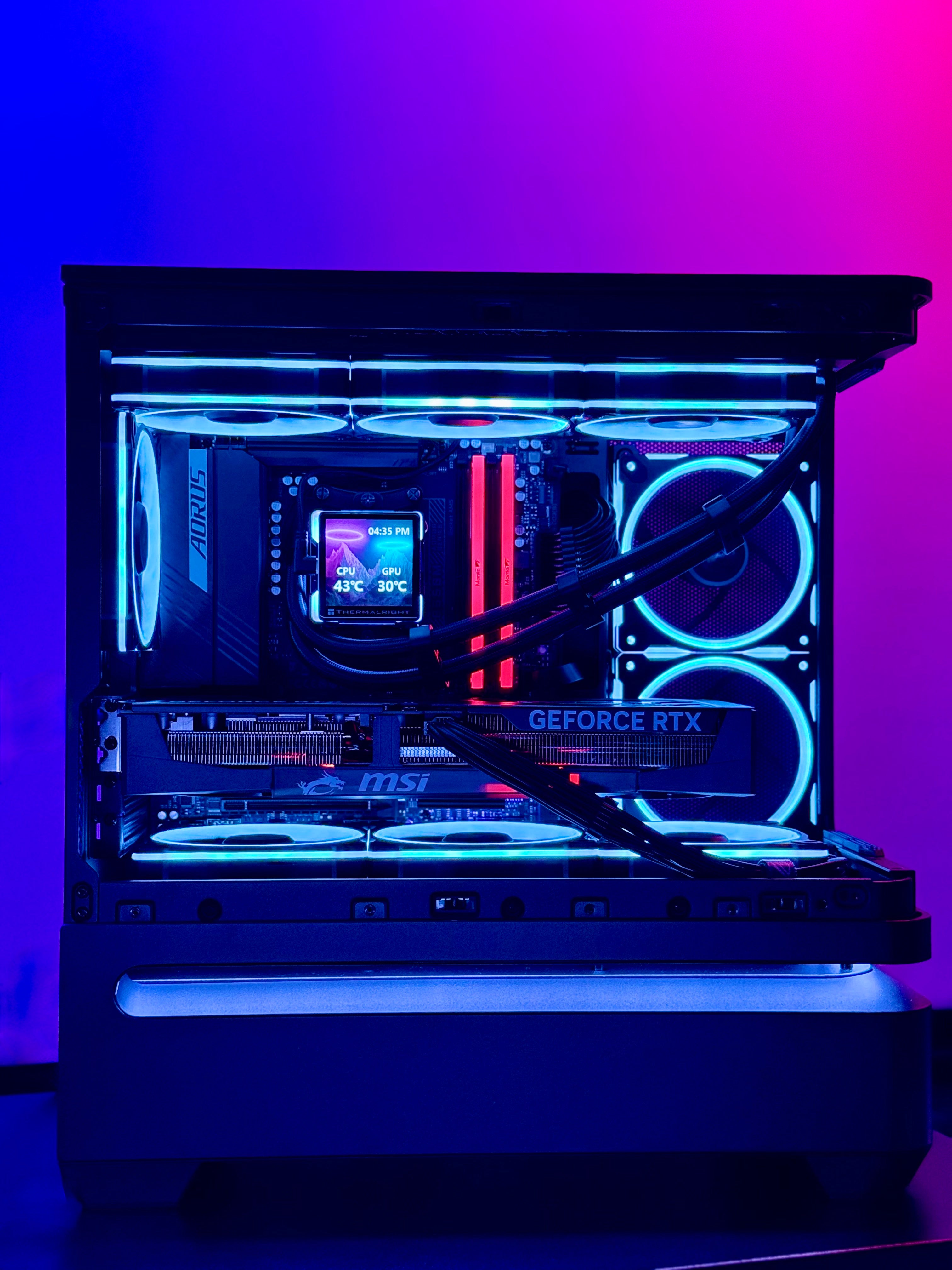 High-end gaming PC called Let's Ride by Shook PC featuring a 5070 Ti and 9850X3D in the ASUS AP202 mATX Desktop Case.