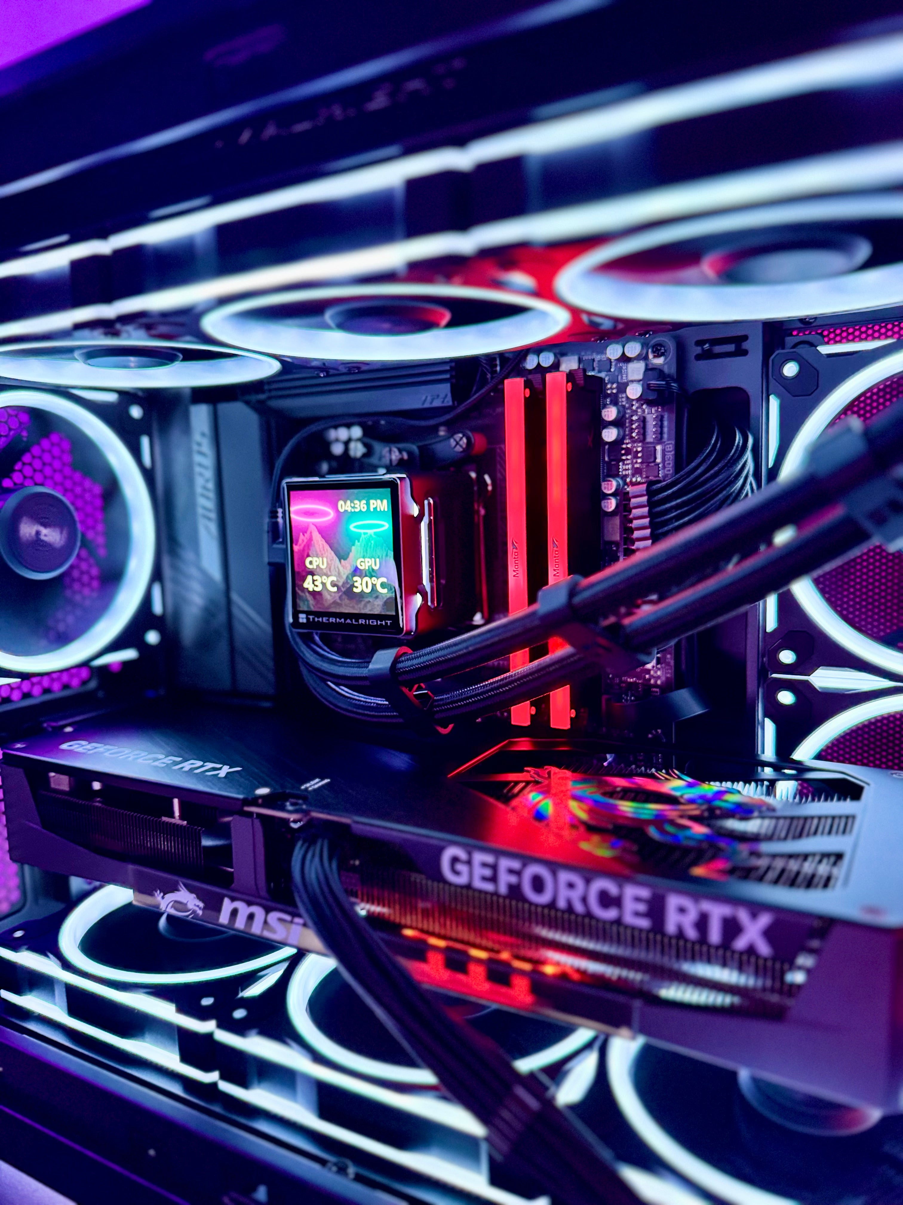 High-end gaming PC called Let's Ride by Shook PC featuring a 5070 Ti and 9850X3D in the ASUS AP202 mATX Desktop Case.