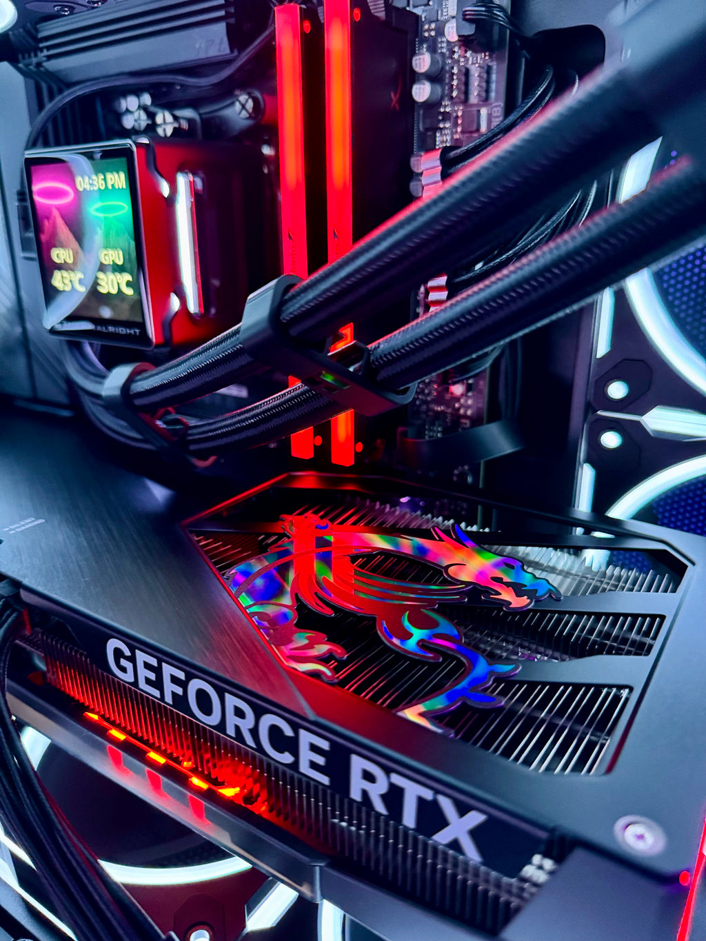 High-end gaming PC called Let's Ride by Shook PC featuring a 5070 Ti and 9850X3D in the ASUS AP202 mATX Desktop Case.