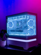 Glowing computer case with visible components on a purple background