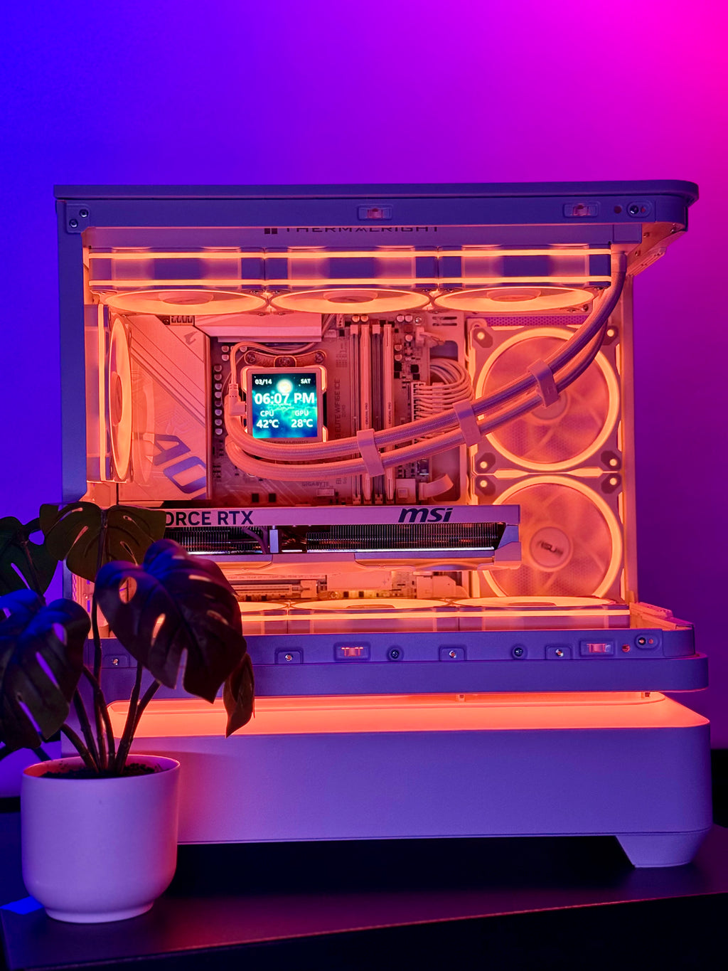 Computer case with visible hardware components on a purple background