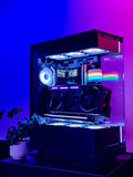 Custom-built computer case with RGB lighting on a purple background