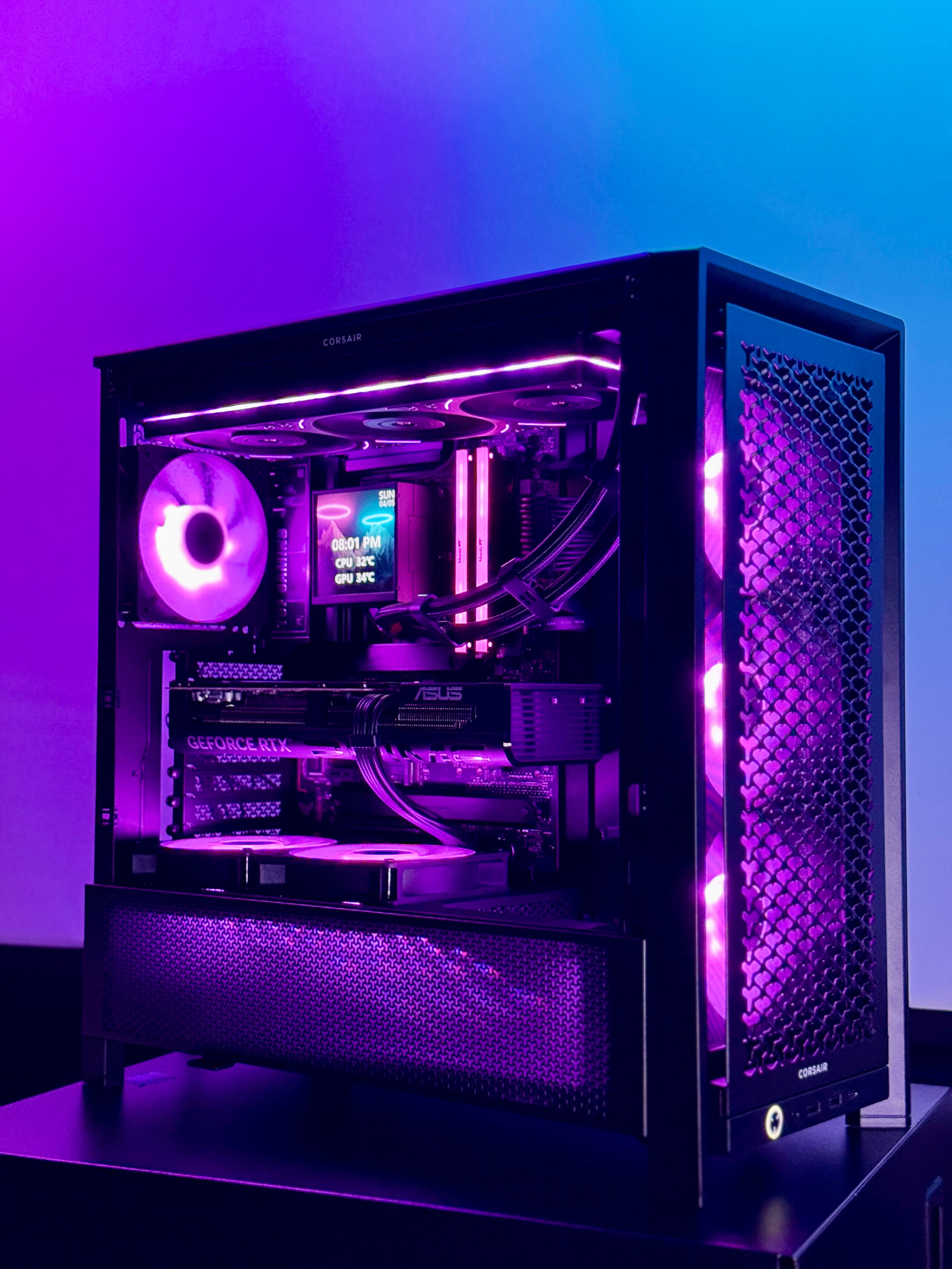 Computer case with visible components on a gradient purple and blue background
