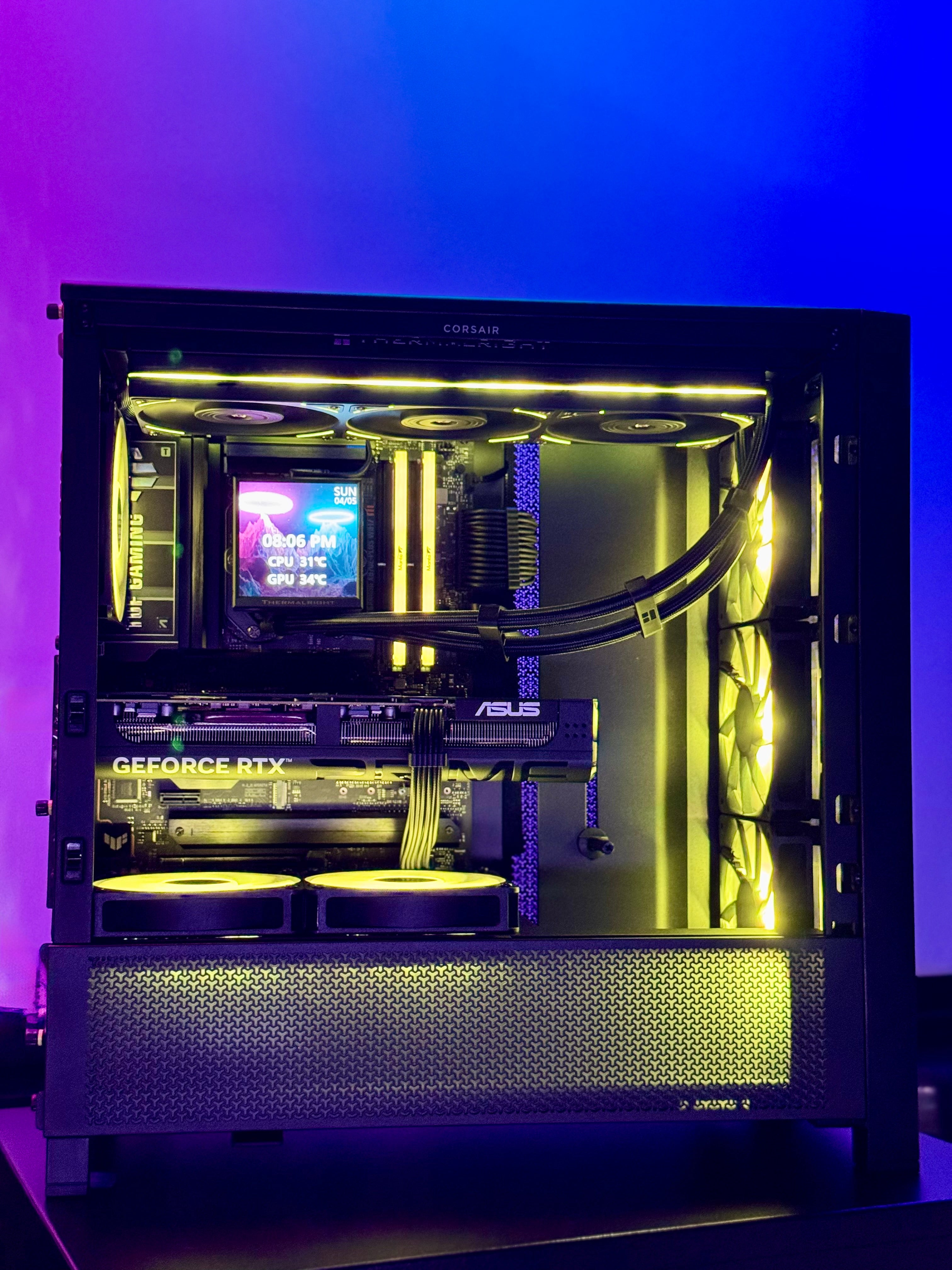 Computer case with visible components against a gradient purple and blue background