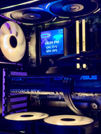 Close-up of a computer motherboard with ASUS branding and GPU temperature display.