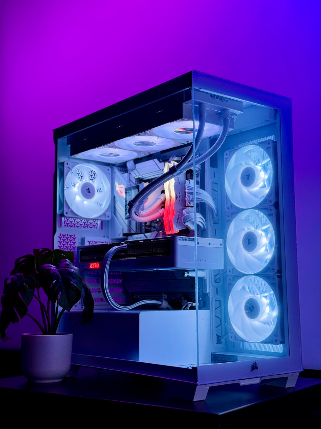Computer case with LED lights on a purple gradient background