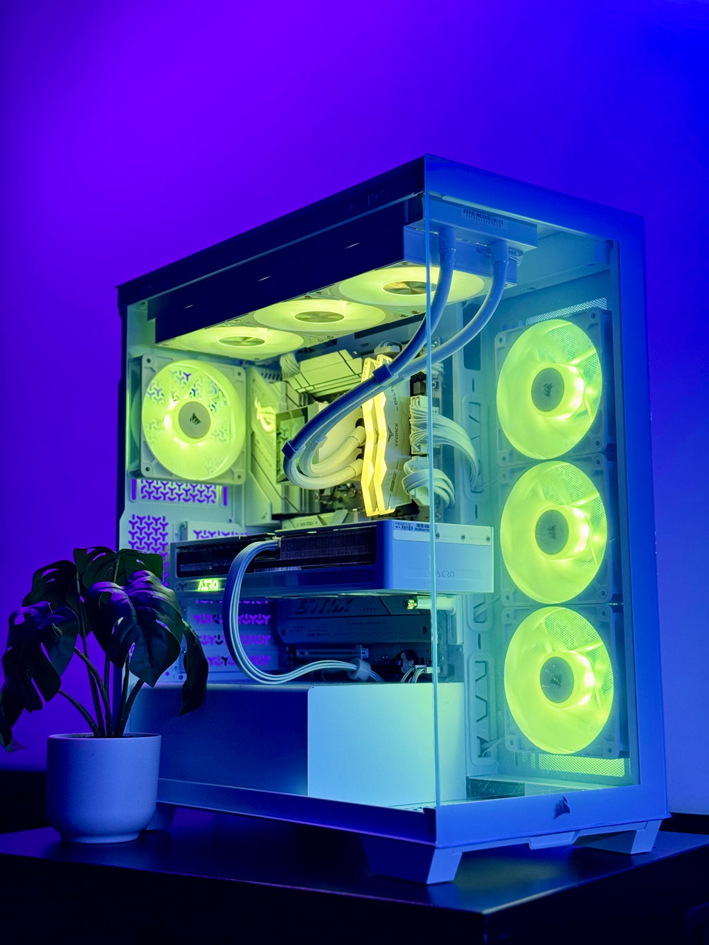 Computer case with green LED lights on a purple background
