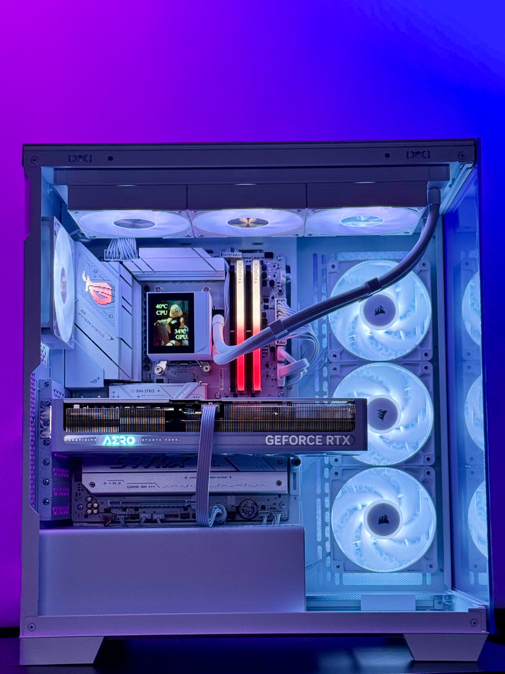 Open computer case with visible components against a purple gradient background