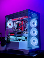 A custom-built desktop PC with a transparent side panel, showcasing a white and black liquid CPU cooler with red accents, three white fans on the front, and a graphics card slot, illuminated by purple and blue LED lighting against a purple background.